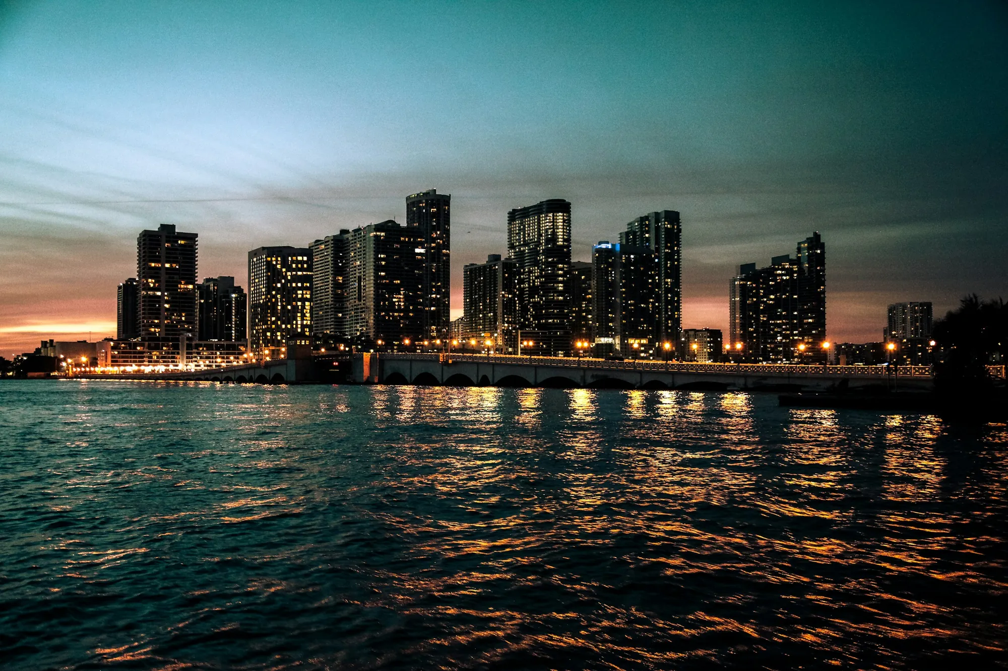 The downtown Miami skyline at night across the water