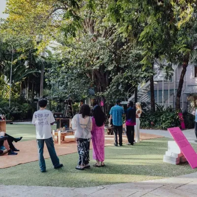 Guests talking in the courtyard