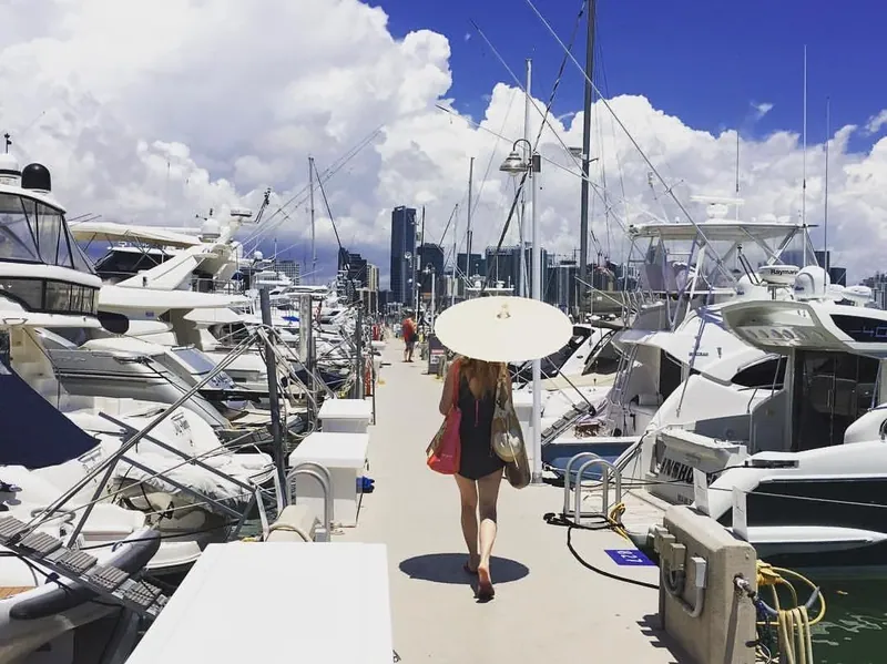 A guest looking out over the boats on the Miami River