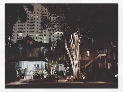 The property lit warmly after dark
